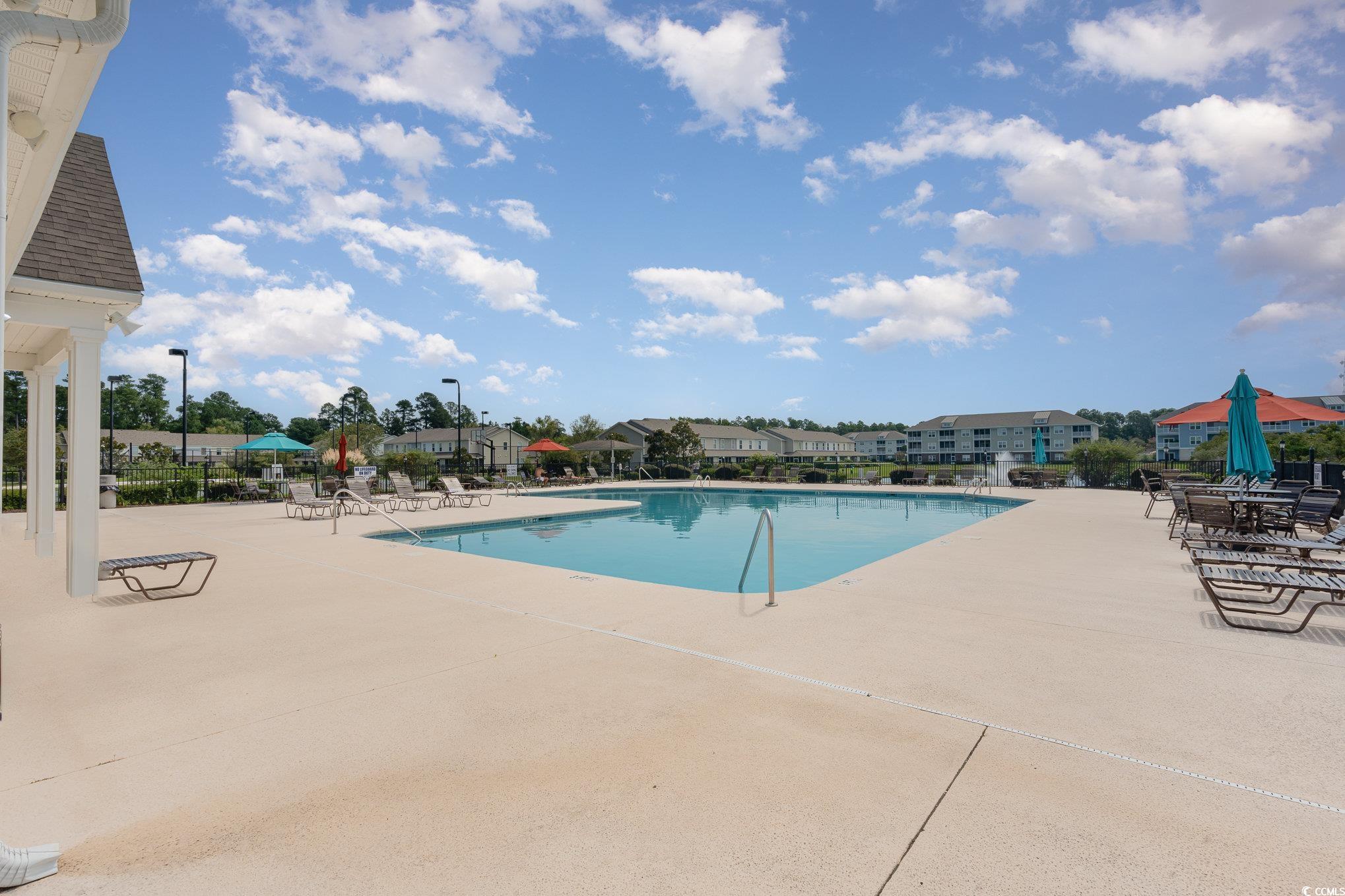 336 Kiskadee Loop, Unit A Conway, SC 29526 - Photo 2 of 27 View of pool with a patio
