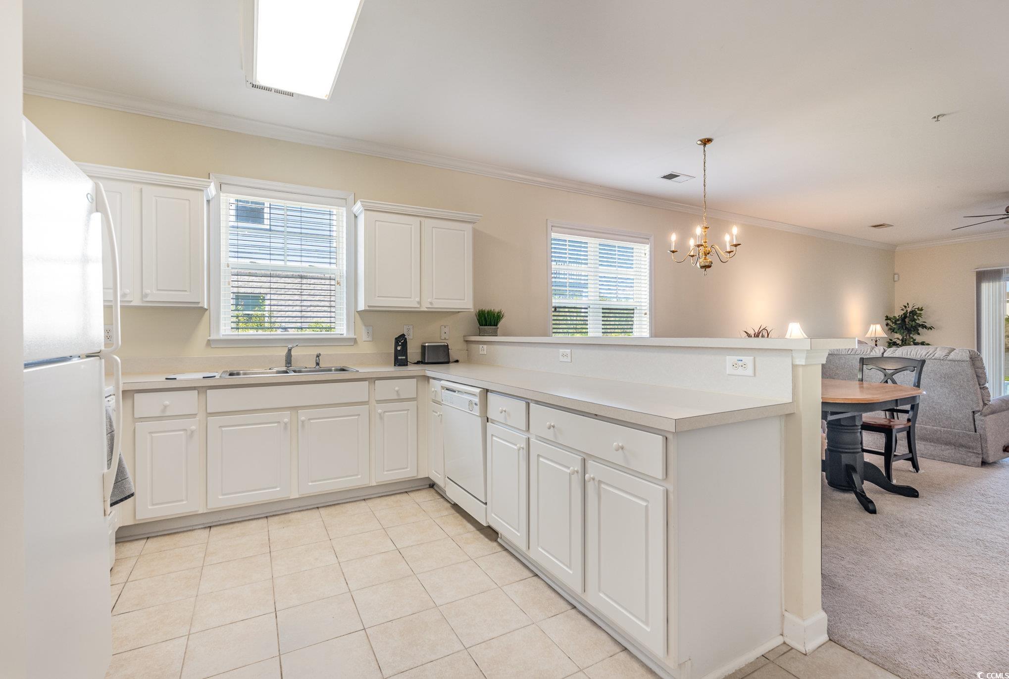 336 Kiskadee Loop, Unit A Conway, SC 29526 - Photo 9 of 27 Kitchen with light tile patterned flooring, a weal