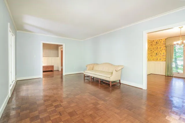a living room with furniture and a table