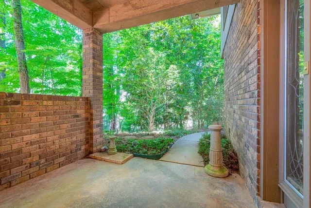 a view of a back yard from a room