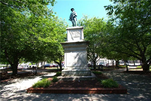 a sign on the side of a road