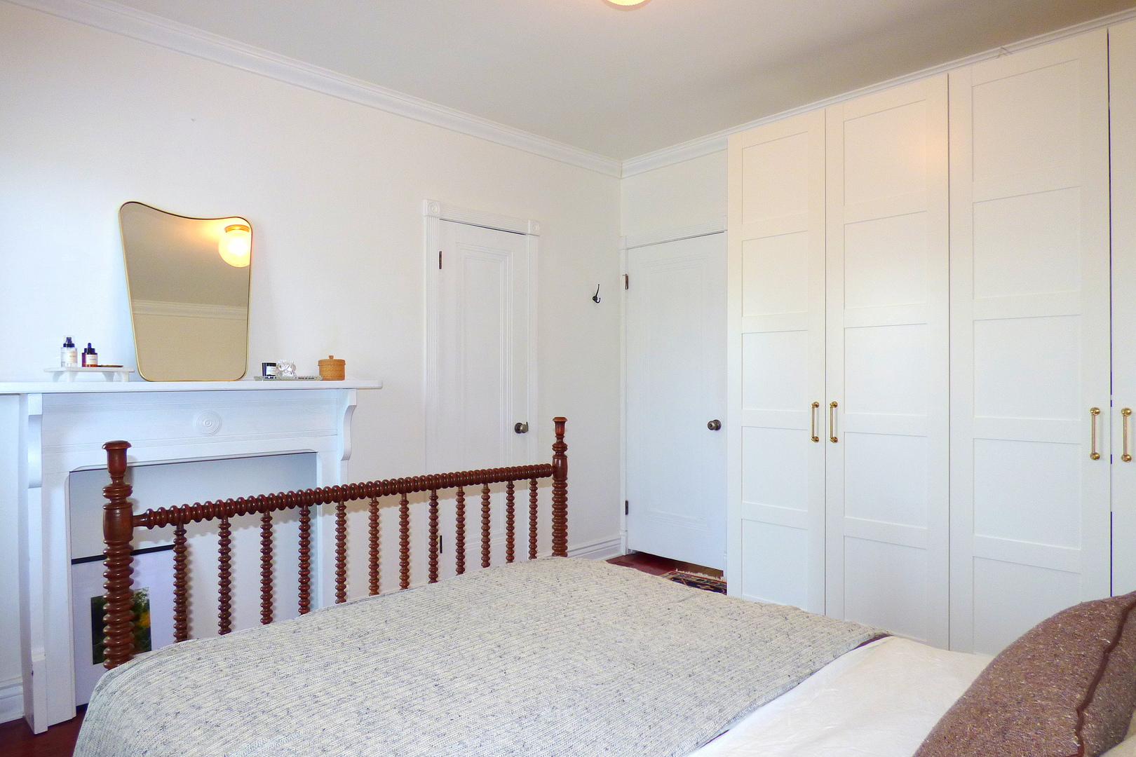 3313 North Rutherford Avenue Chicago, IL 60634 - Photo 15 of 38 a bedroom with a bed and a mirror