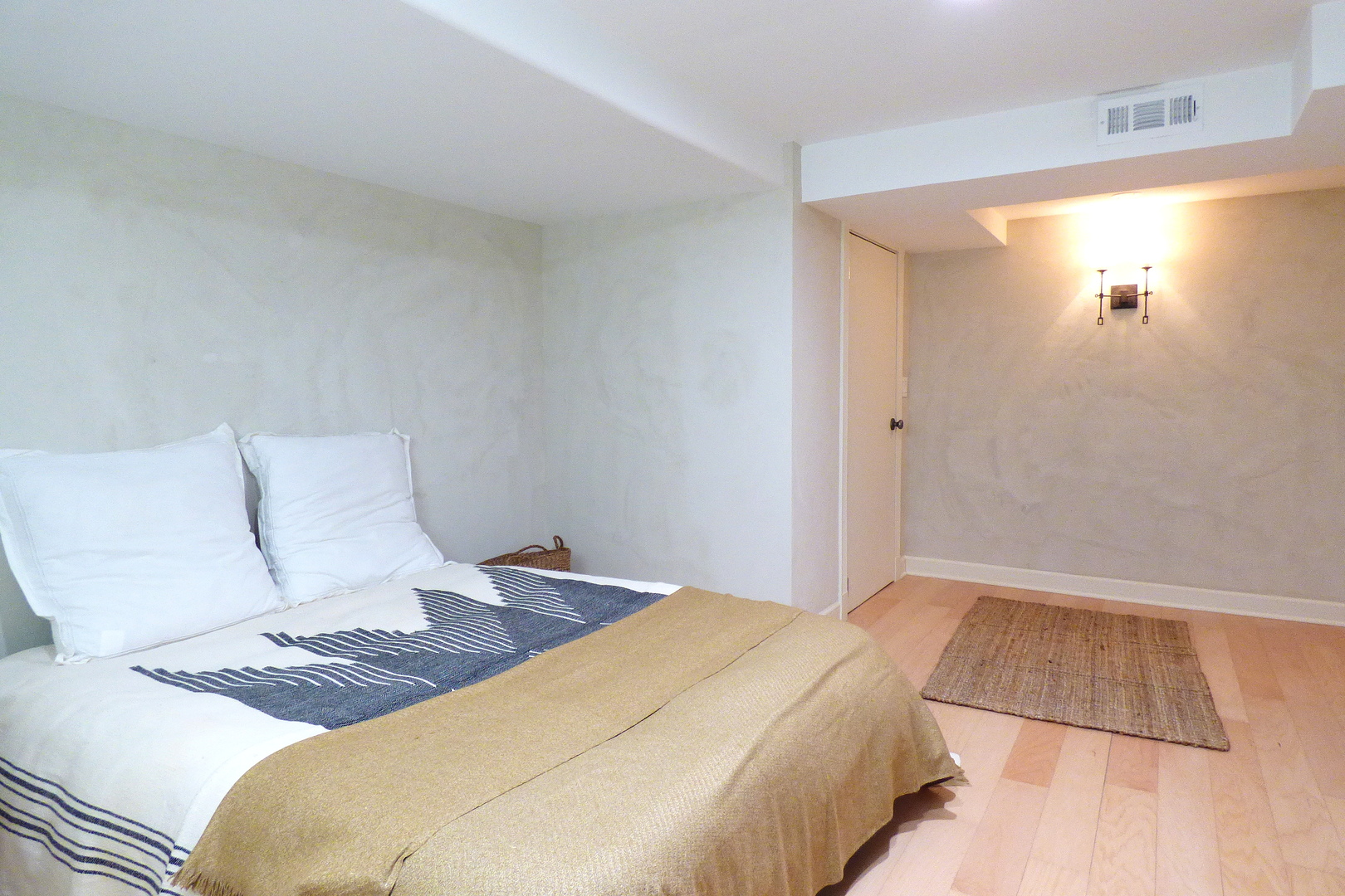 3313 North Rutherford Avenue Chicago, IL 60634 - Photo 28 of 38 a bedroom with a bed and a night stand