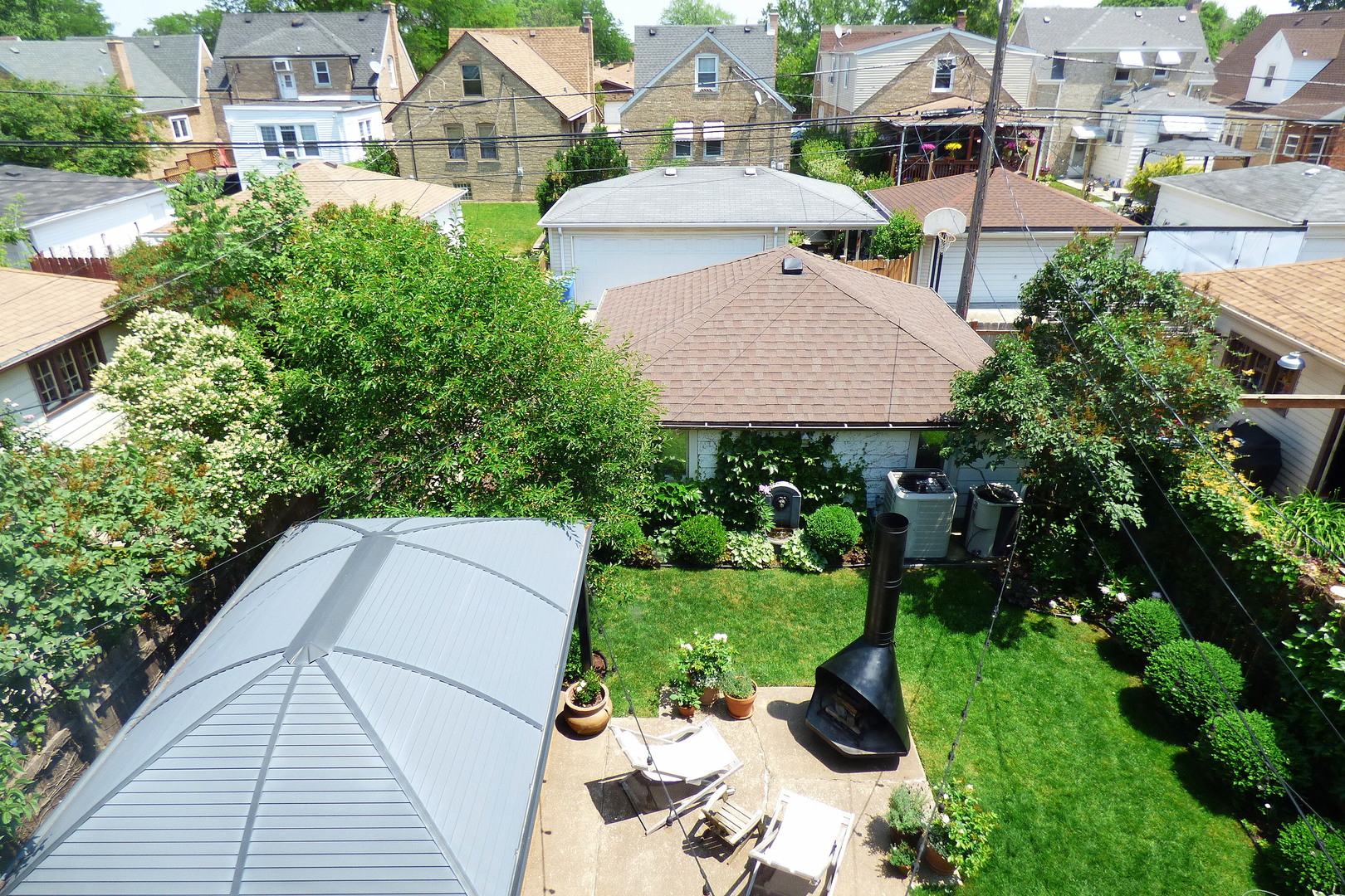 3313 North Rutherford Avenue Chicago, IL 60634 - Photo 36 of 38 a aerial view of a house with garden space and street view