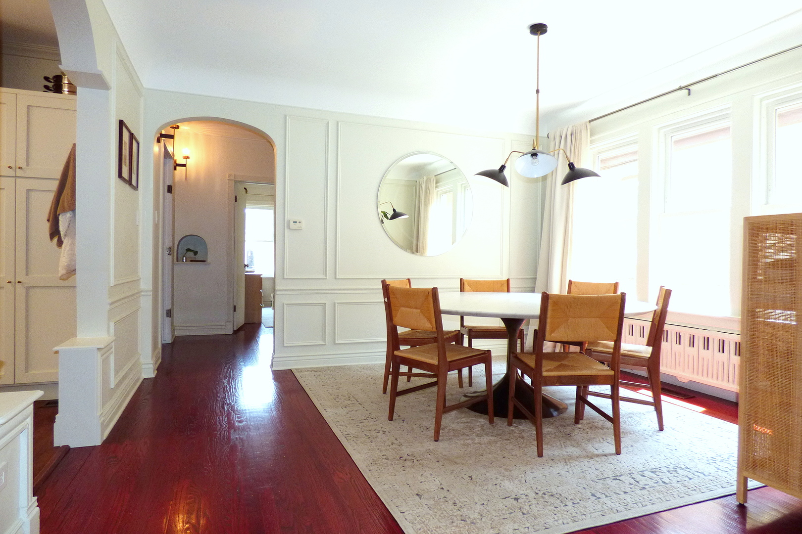 3313 North Rutherford Avenue Chicago, IL 60634 - Photo 4 of 38 a view of a dining room with furniture and wooden floor