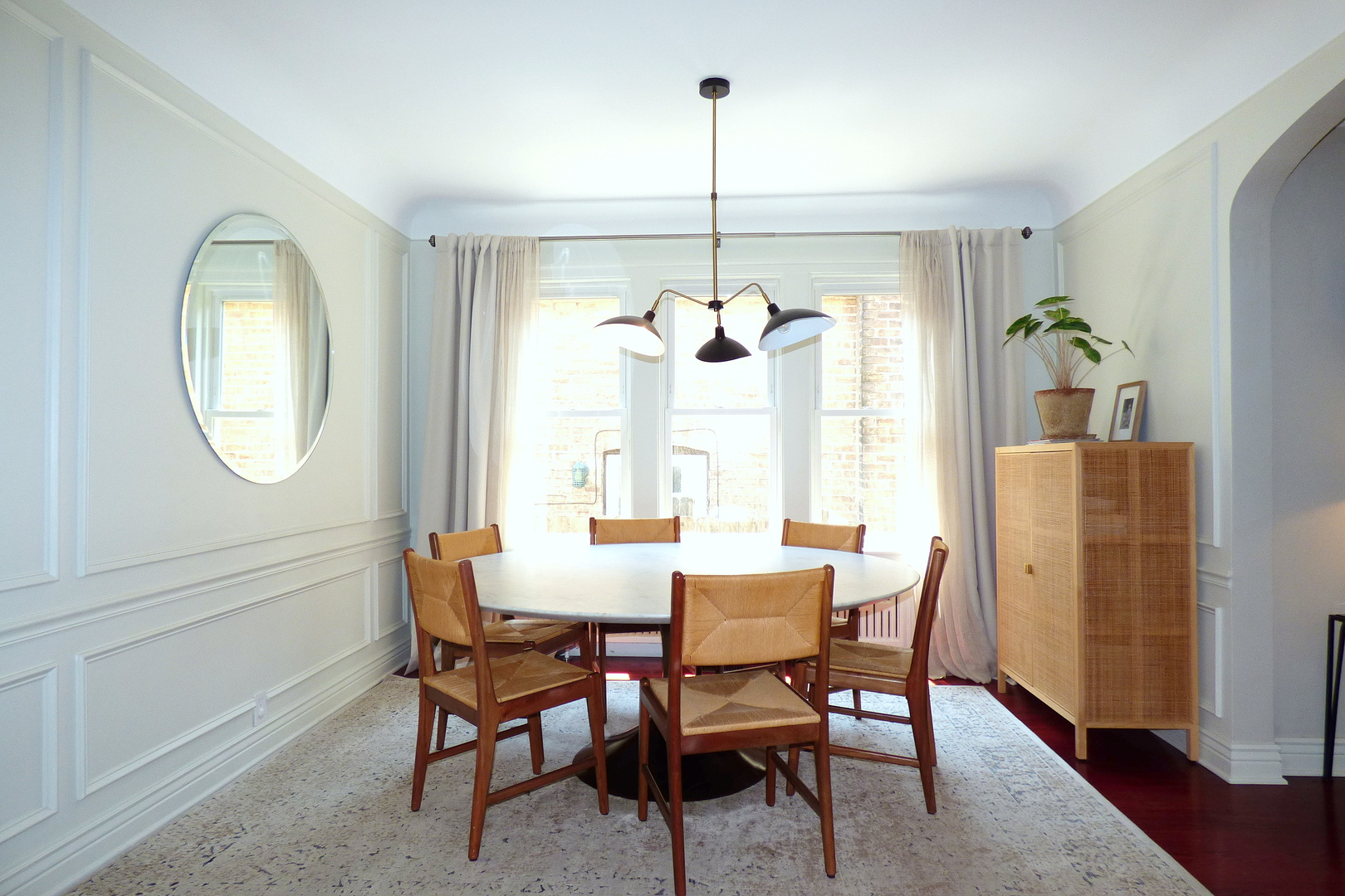 3313 North Rutherford Avenue Chicago, IL 60634 - Photo 10 of 38 a view of a dining room with furniture window and wooden floor