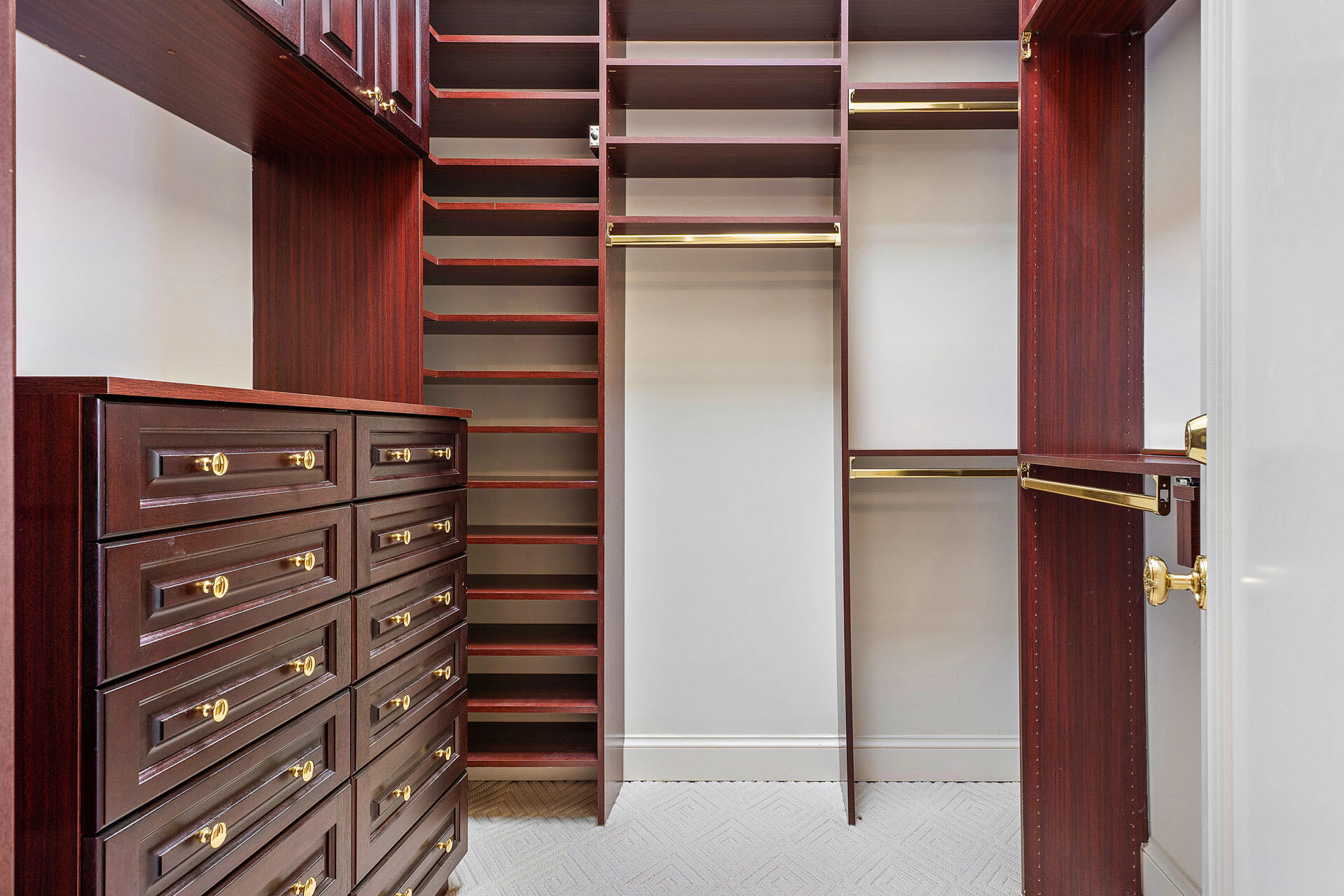 159 Coconut Palm Road Boca Raton, FL 33432 - Photo 39 of 60 a view of walk in closet with empty racks