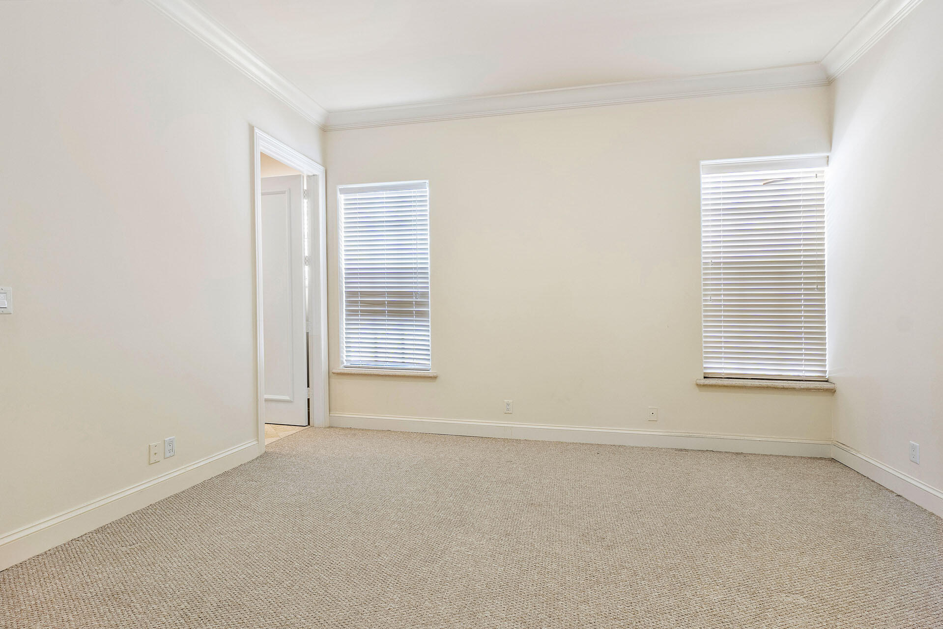 159 Coconut Palm Road Boca Raton, FL 33432 - Photo 42 of 60 an empty room with windows