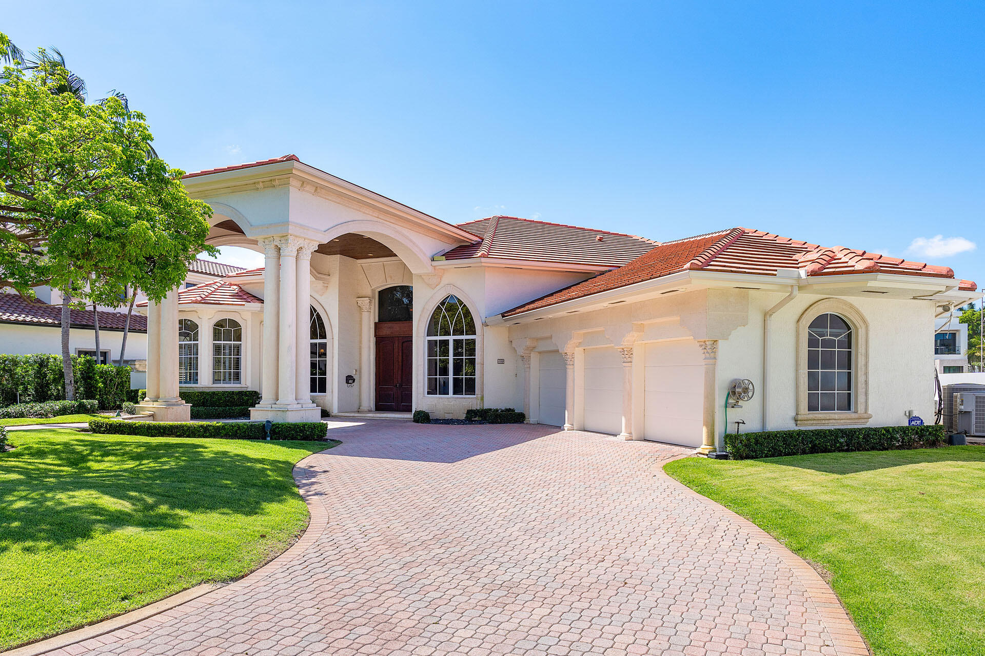 159 Coconut Palm Road Boca Raton, FL 33432 - Photo 5 of 60 a front view of a house with a yard