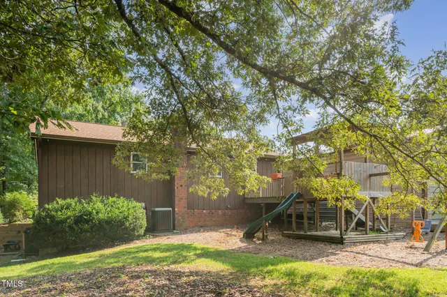 a view of a park with a slide