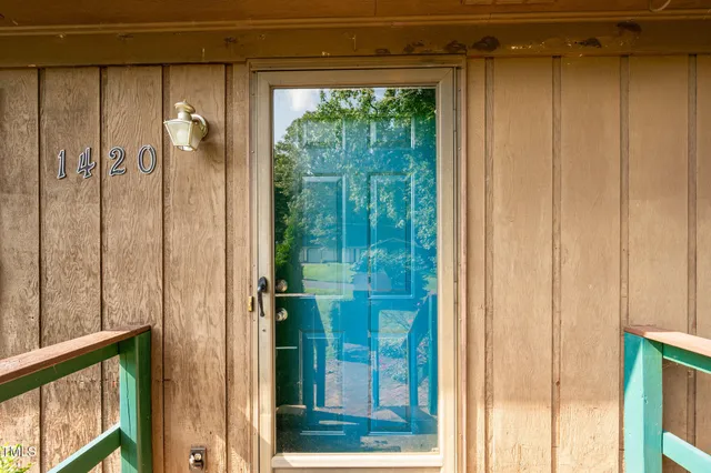 a bathroom with a shower and a window