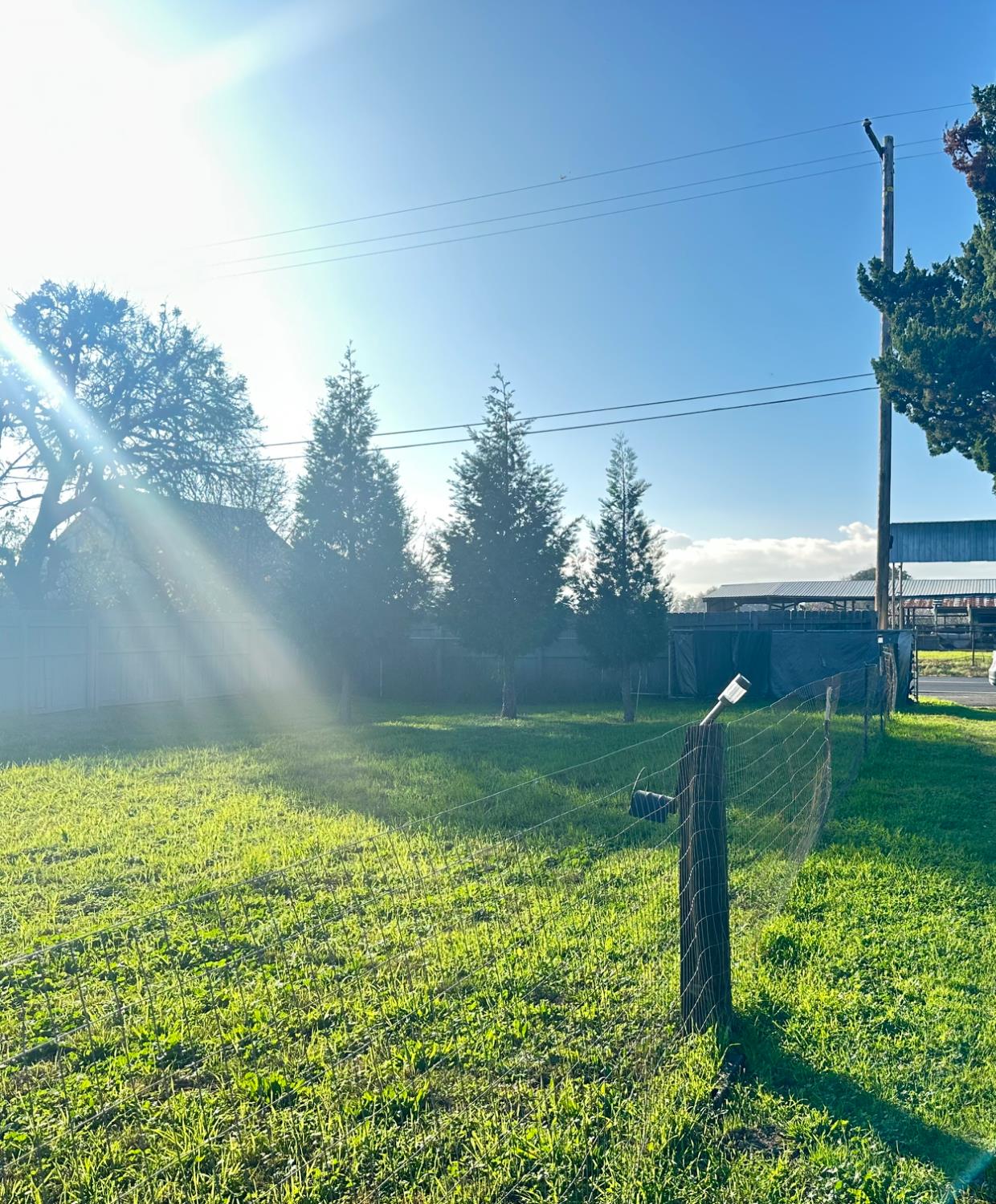 27350 Thornton Road Thornton, CA 95632 - Photo 7 of 11 Private gate entry with road leading you to the back of the 2care property. Beautiful open spaces within the property.