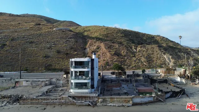a view of a house with a mountain