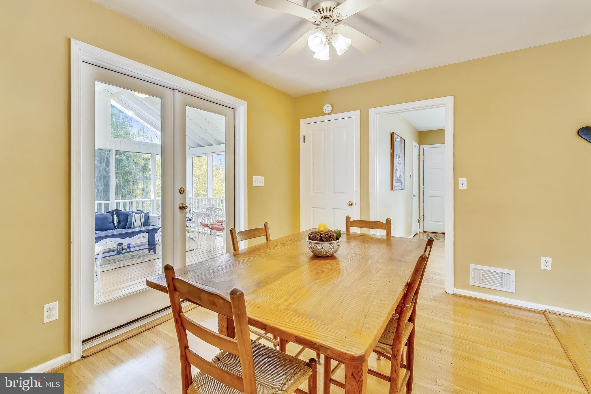 6316 Bells Mill Road Bethesda, MD 20817 - Photo 11 of 33 View from dining area to screened porch
