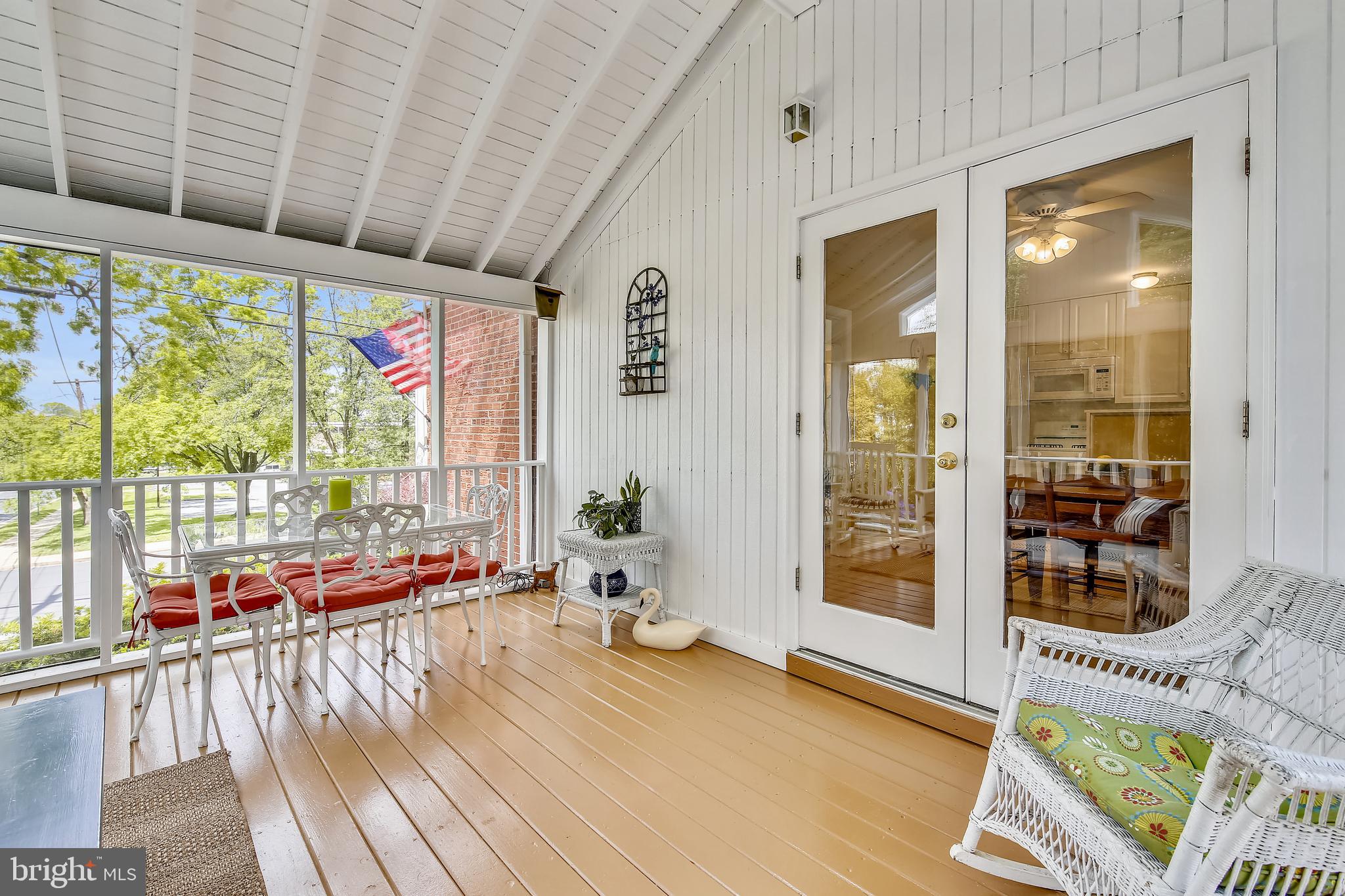 6316 Bells Mill Road Bethesda, MD 20817 - Photo 12 of 33 French Doors exit to lovely screened-in porch