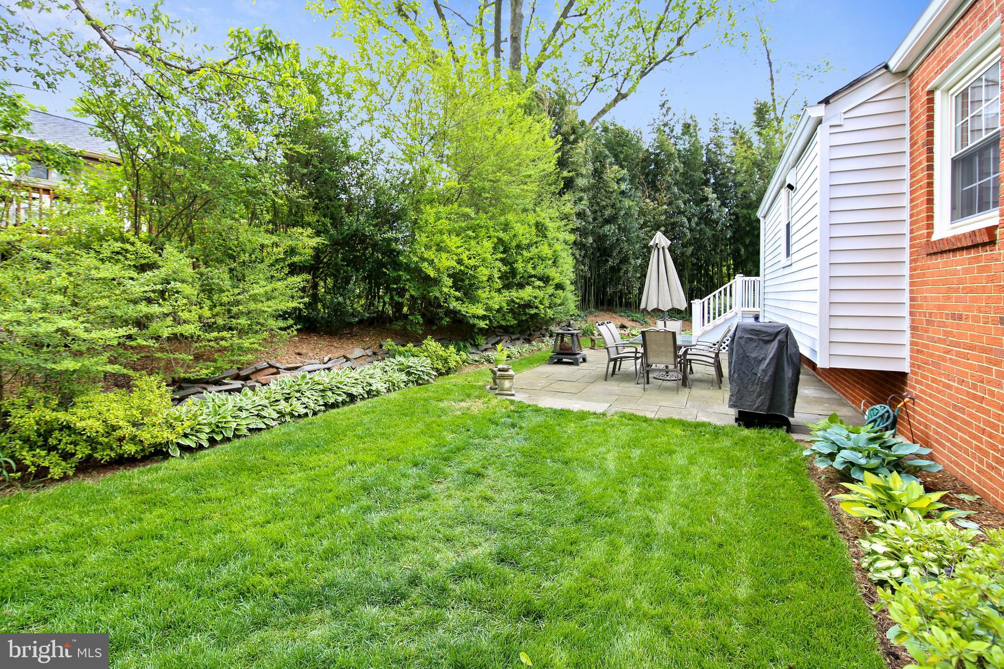 6316 Bells Mill Road Bethesda, MD 20817 - Photo 30 of 33 Fully fenced backyard with slate patio