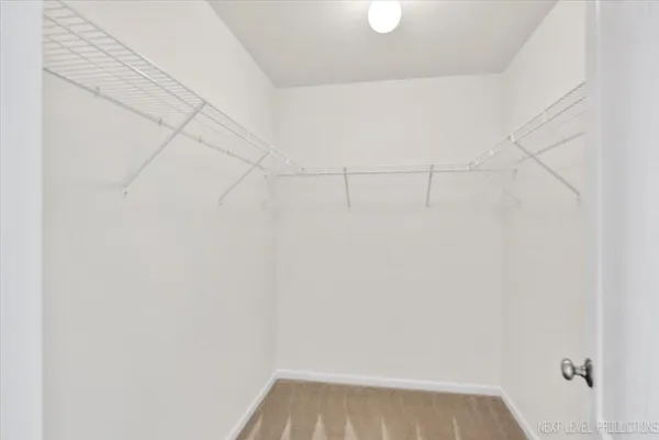 a view of a room with racks on the wall