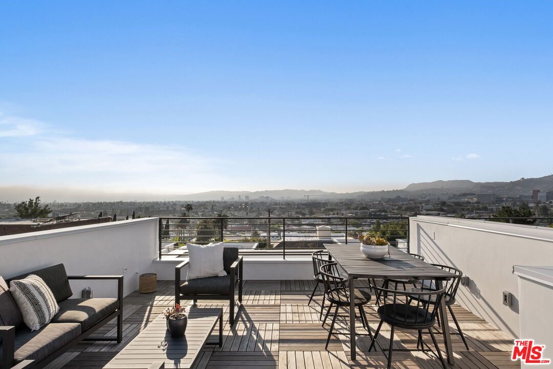 a view of a terrace with seating area