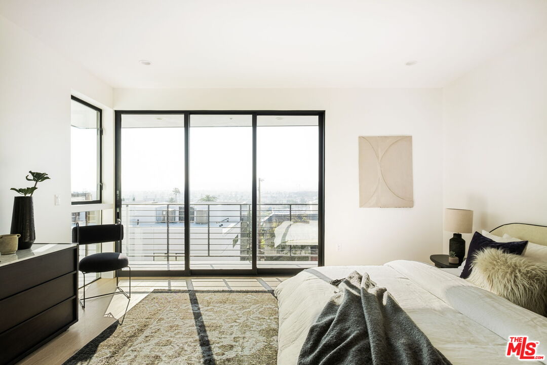762 North Arthur Road Los Angeles, CA 90029 - Photo 16 of 30 a bedroom with a bed and a large window