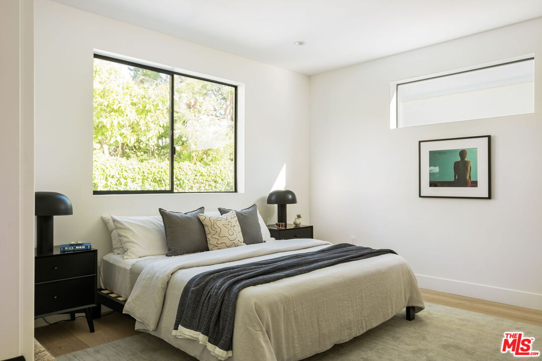 762 North Arthur Road Los Angeles, CA 90029 - Photo 23 of 30 a bedroom with a bed and a window