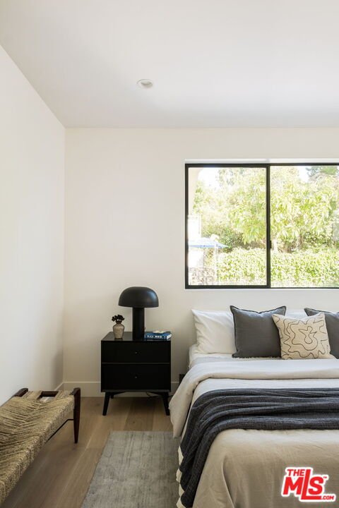762 North Arthur Road Los Angeles, CA 90029 - Photo 24 of 30 a bedroom with a bed and a window