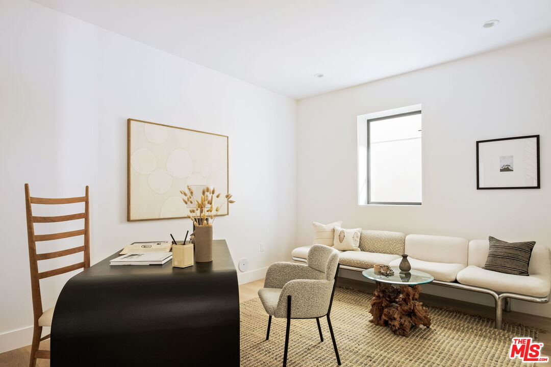 762 North Arthur Road Los Angeles, CA 90029 - Photo 26 of 30 a bedroom with furniture and a wooden floor
