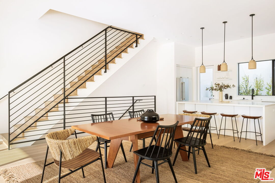 762 North Arthur Road Los Angeles, CA 90029 - Photo 6 of 30 a dining room with furniture and wooden floor