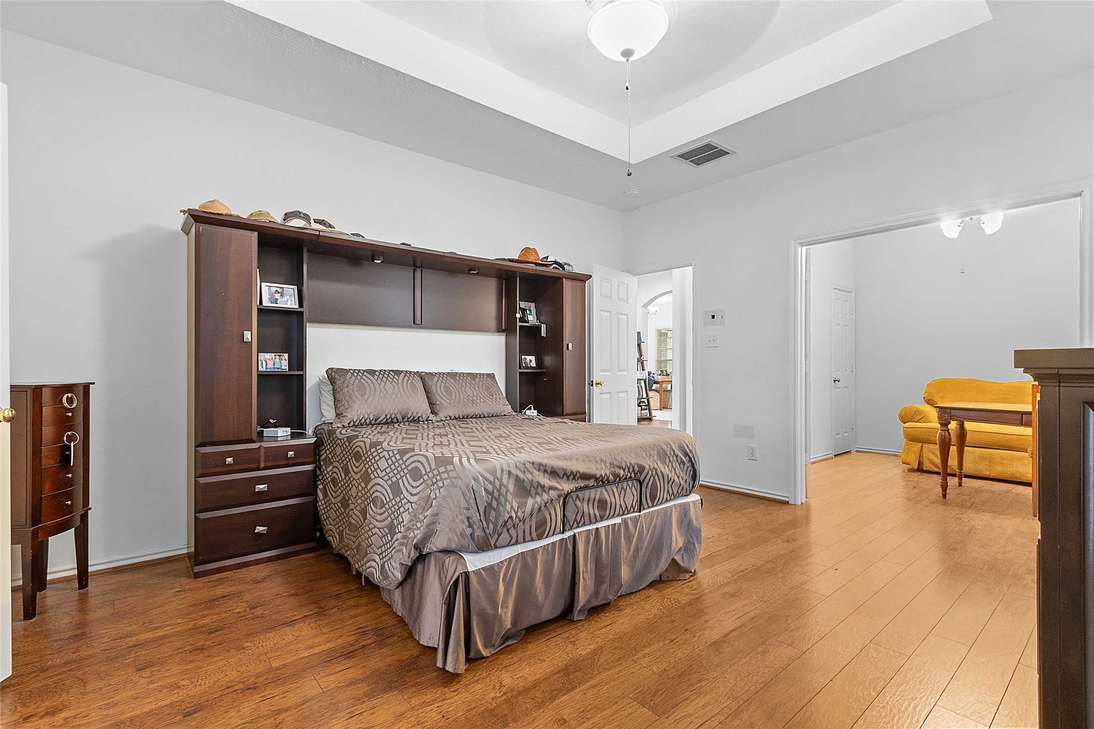 21014 Jessica Rose Lane Spring, TX 77379 - Photo 21 of 30 a bedroom with a bed and a table