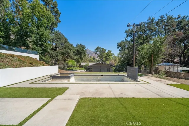 a view of a back yard of the house
