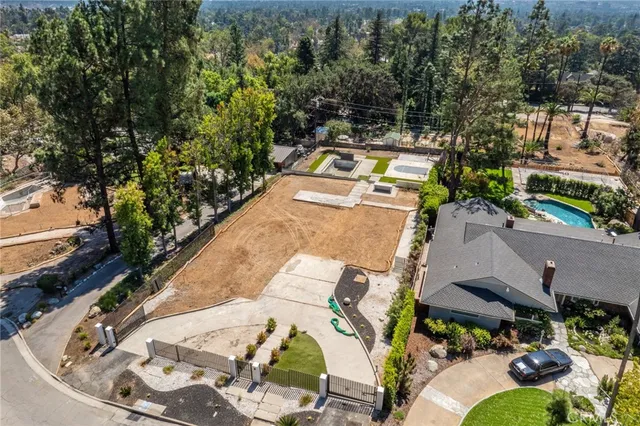 an aerial view of a house with a garden