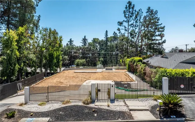 a view of a swimming pool with a patio