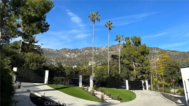 a view of a swimming pool with an outdoor space and seating area