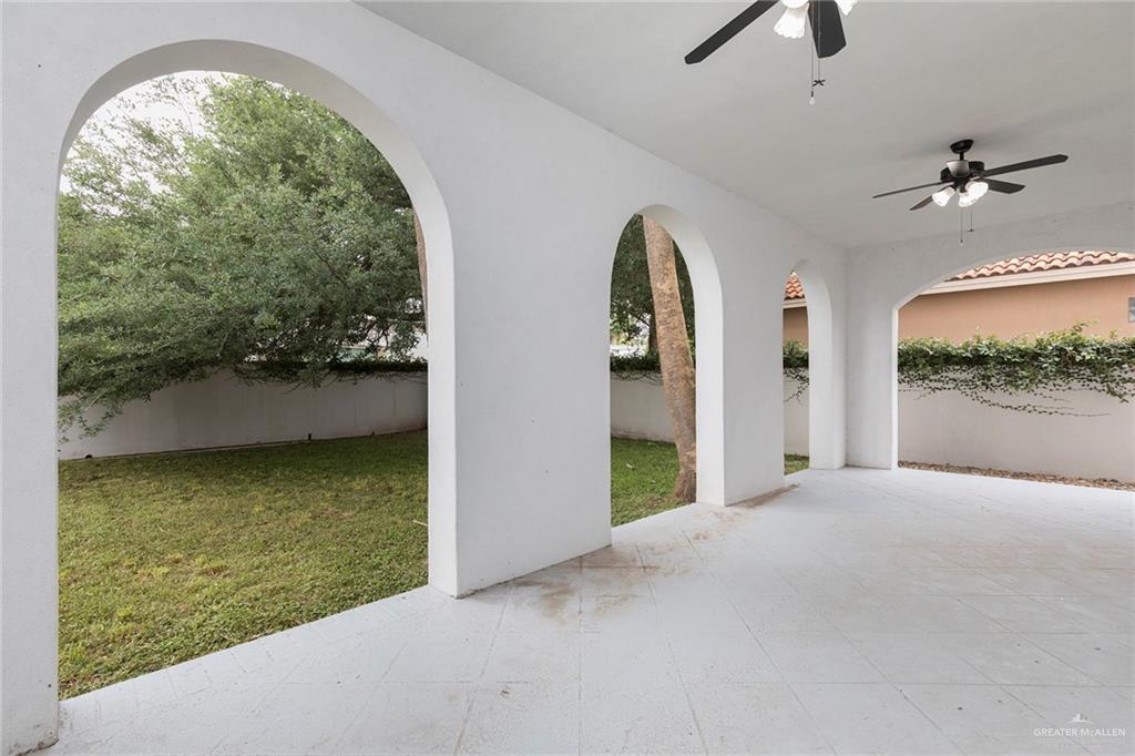 2216 South 45th Street McAllen, TX 78503 - Photo 32 of 40 a view of a livingroom with furniture and chandelier fan