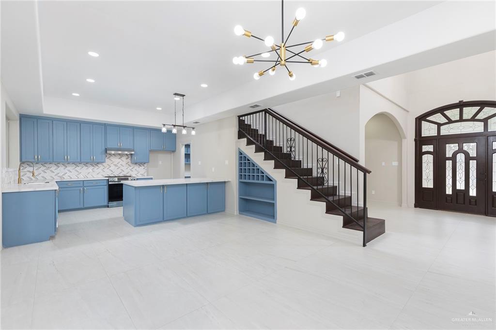 2216 South 45th Street McAllen, TX 78503 - Photo 8 of 40 a view of a kitchen with electric appliances