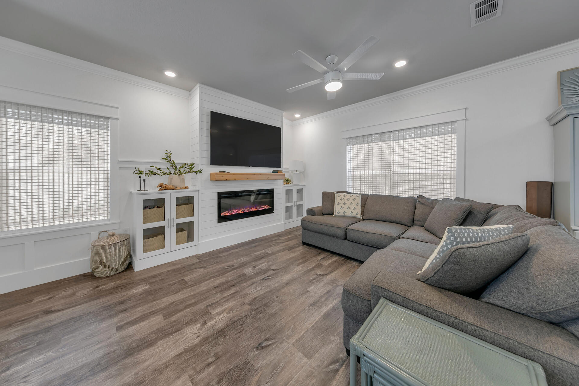 148 Stonegate Circle Santa Rosa Beach, FL 32459 - Photo 3 of 28 a living room with furniture and a flat screen tv
