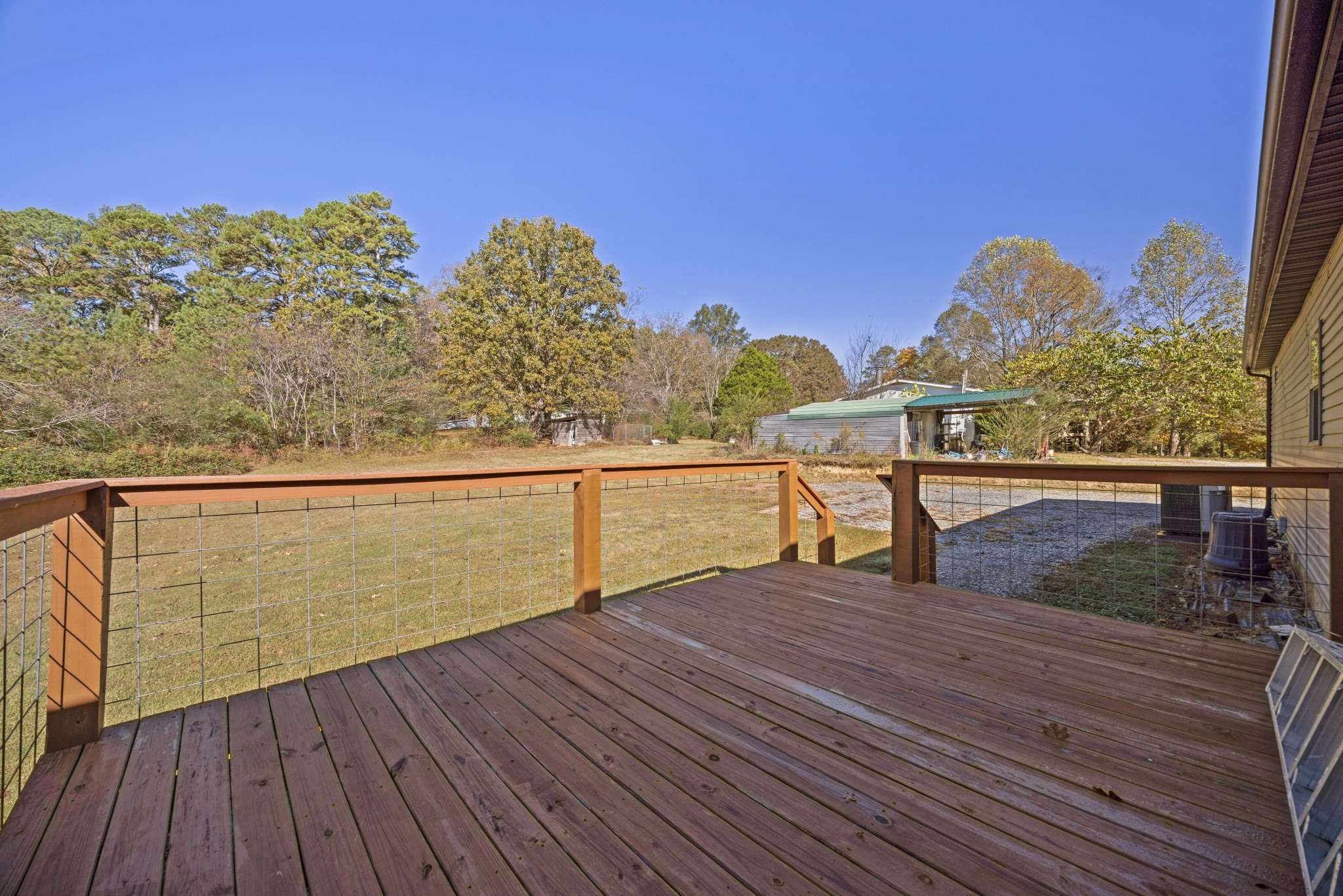 978 Bancroft Road McDonald, TN 37353 - Photo 24 of 29 a view of a balcony with wooden floor and a mountain view