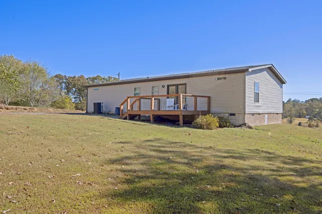 a view of a house with a big yard