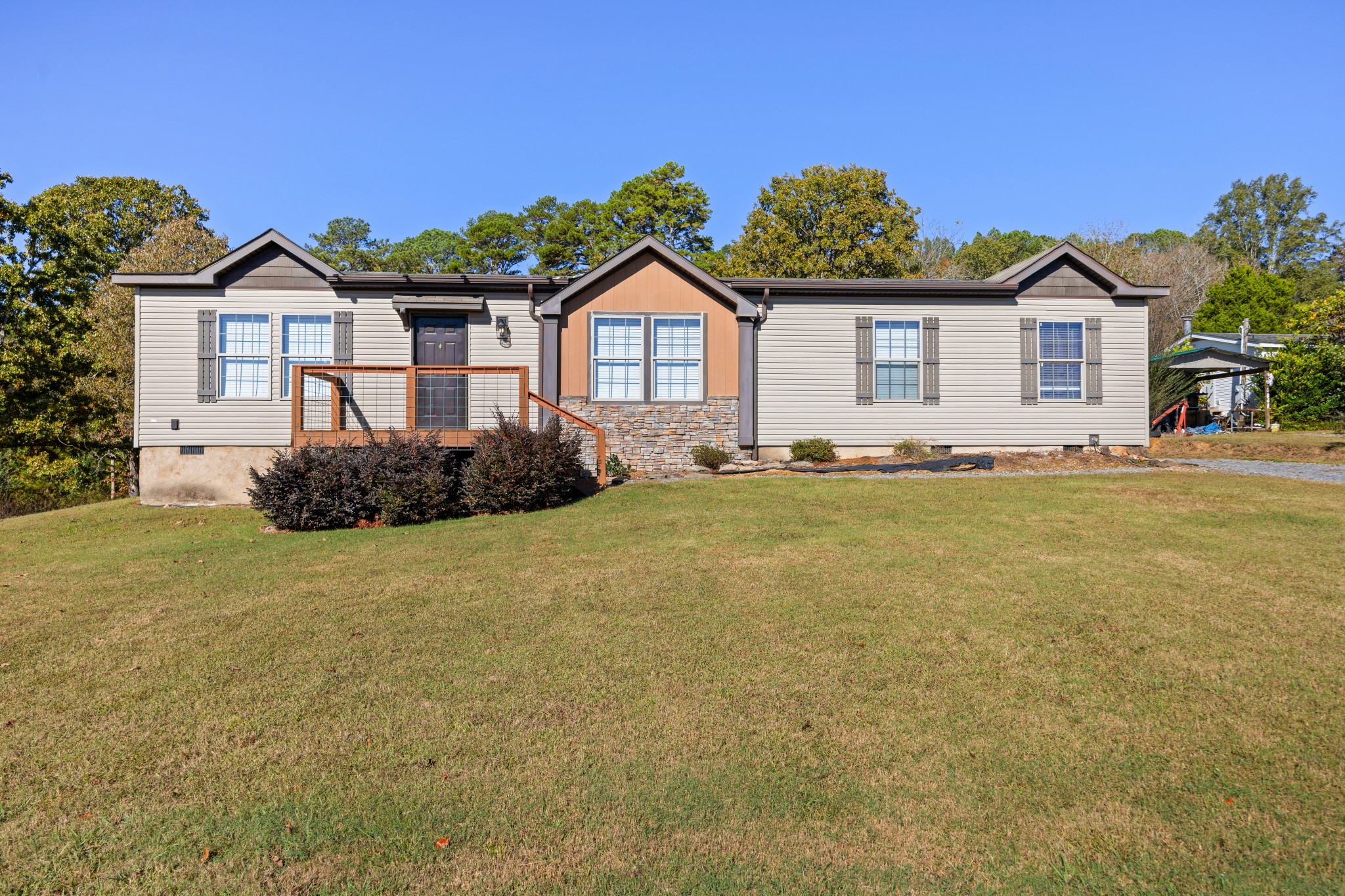 978 Bancroft Road McDonald, TN 37353 - Photo 28 of 29 a front view of a house with a yard and garage