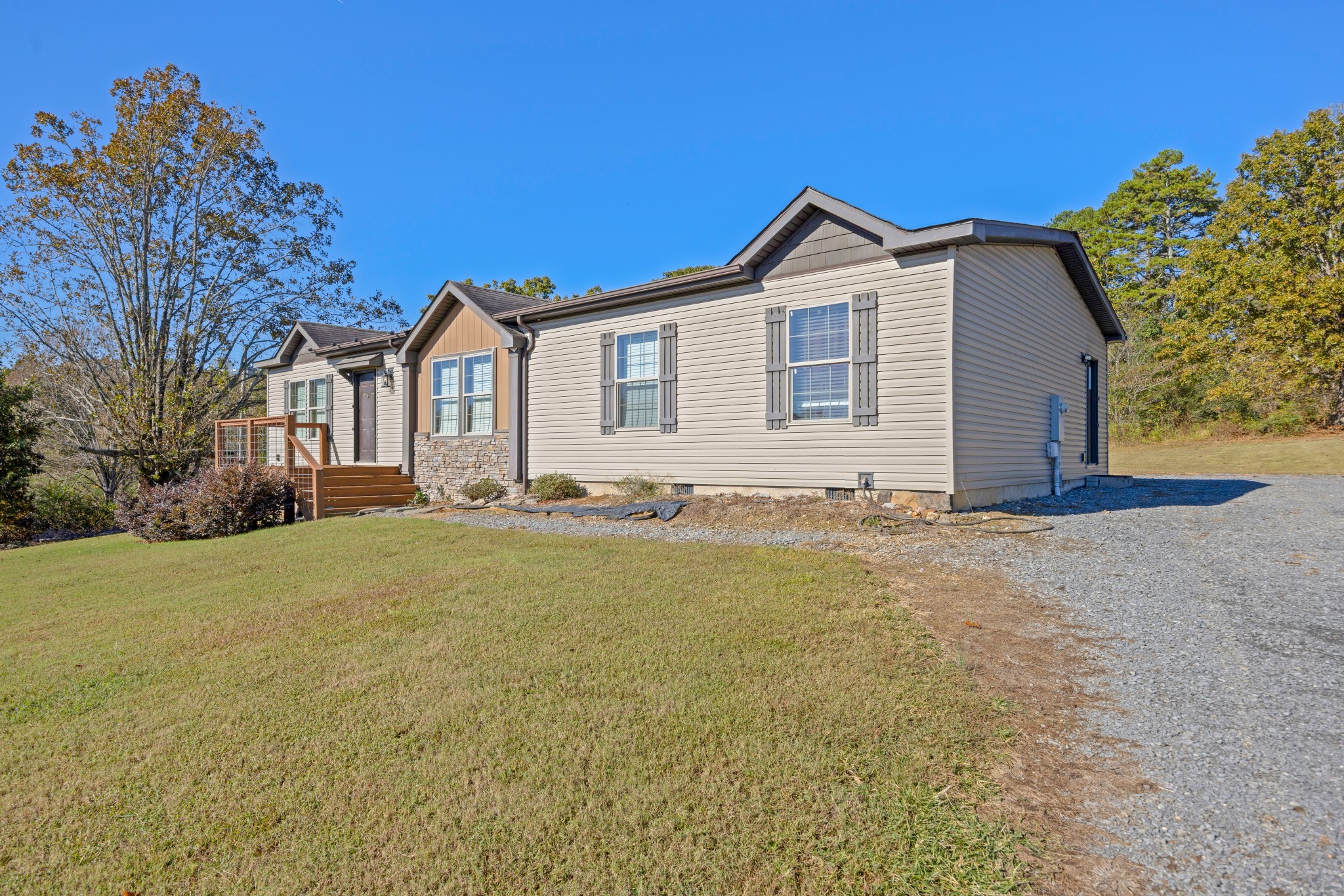 978 Bancroft Road McDonald, TN 37353 - Photo 3 of 29 a view of a house with backyard and trees