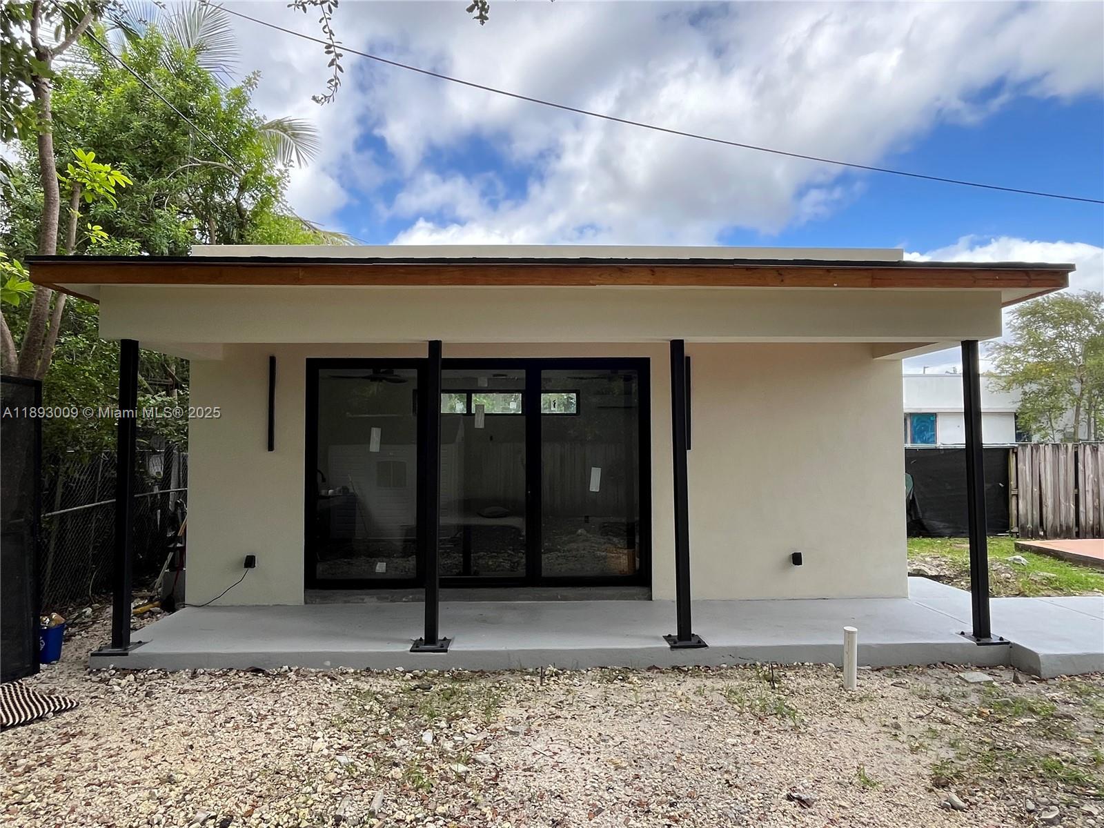 150 Northwest 44th Street Miami, FL 33127 - Photo 10 of 16 a view of a entrance door of the house