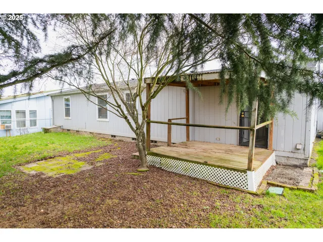 a backyard of a house with lots of green space