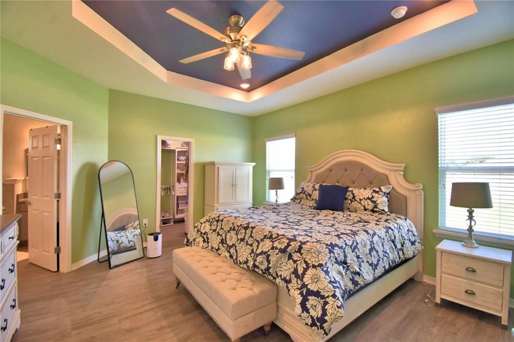 4340 Reding Way Lakeland, FL 33813 - Photo 41 of 63 a bedroom with a bed couch and a window