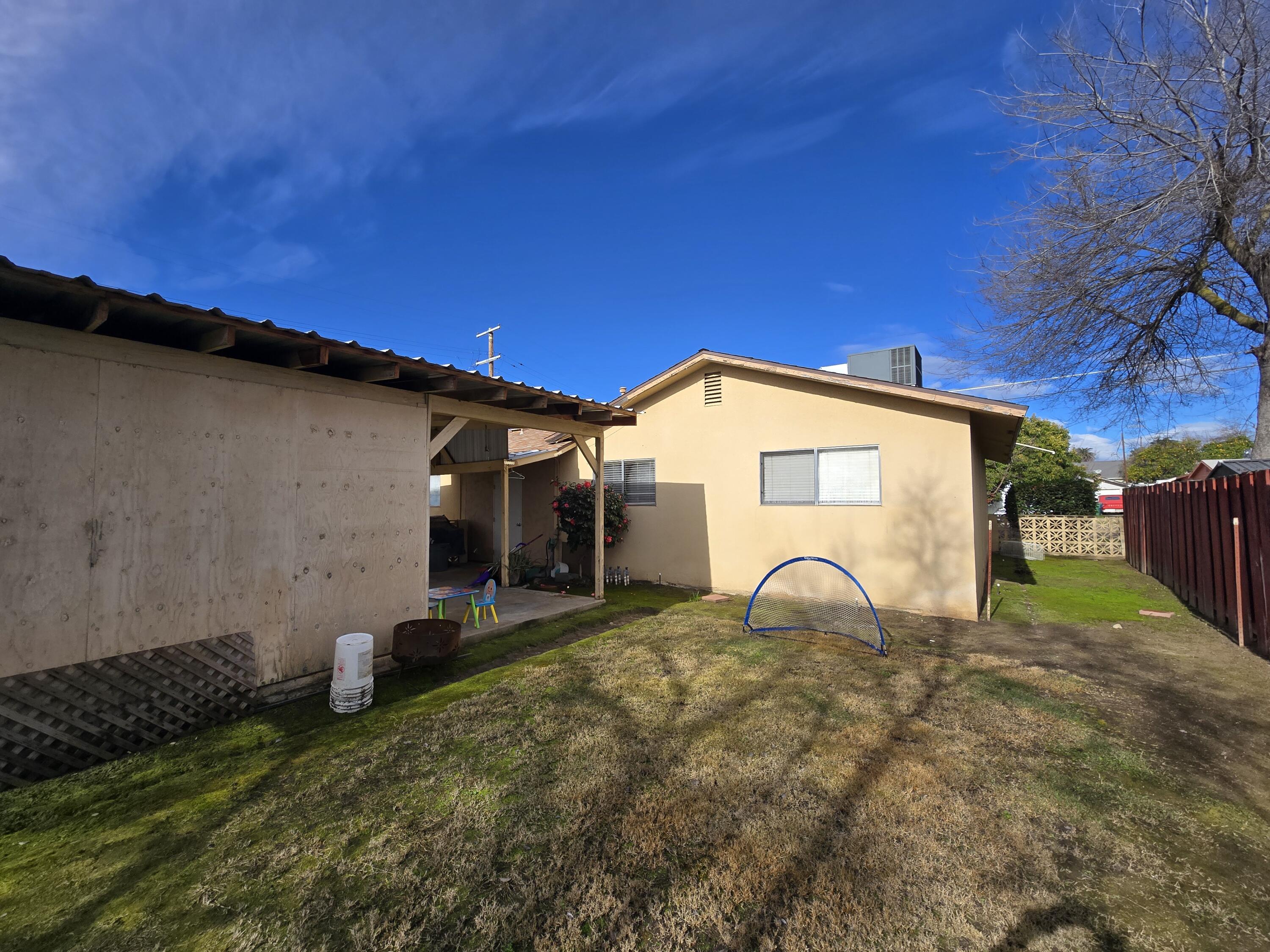 2222-2224 11th Street Reedley, CA 93654 - Photo 10 of 11 a view of a backyard of the house