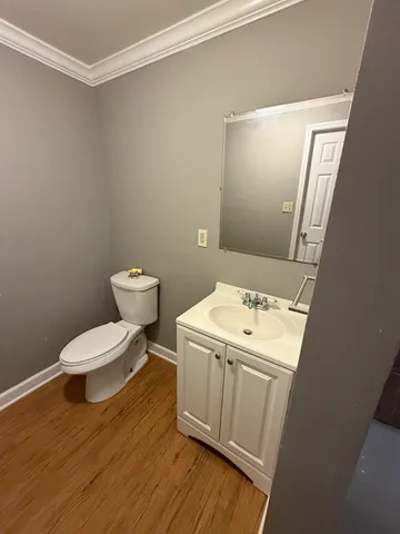 a bathroom with a sink and toilet