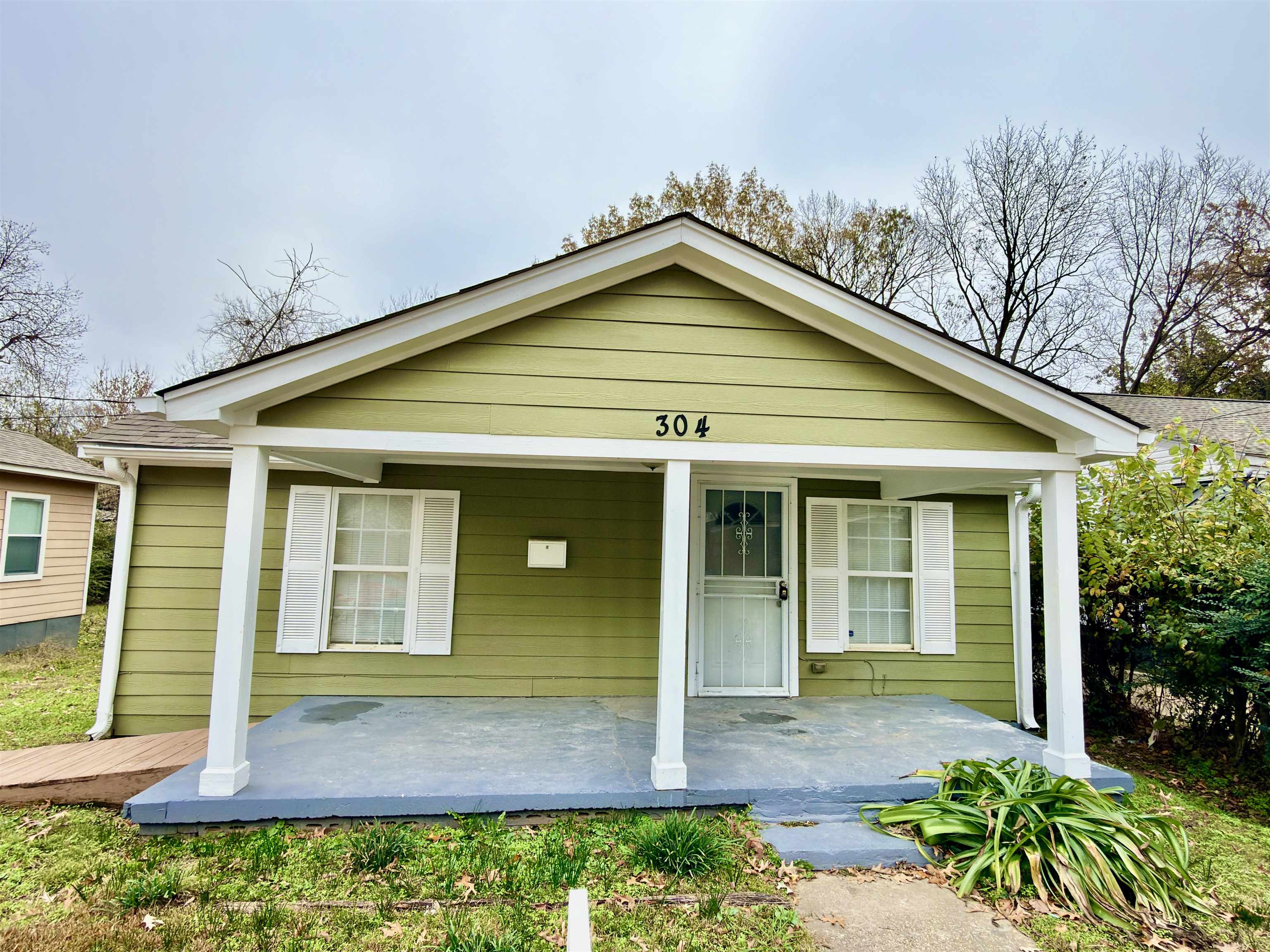304 Harrell Street Memphis, TN 38112 - Photo 9 of 10 front view of a house with a yard