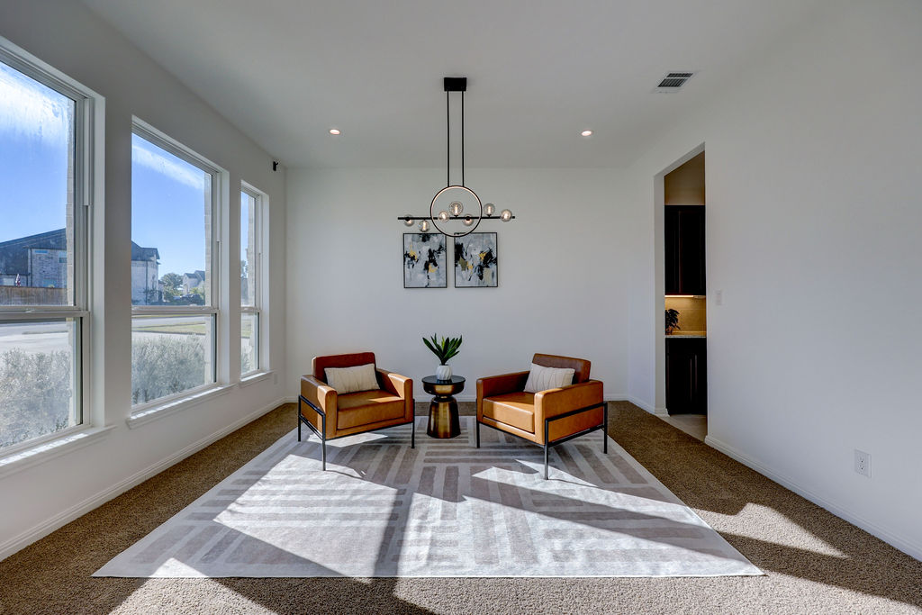 351 Pigeon River Road Kyle, TX 78640 - Photo 6 of 40 Sitting room featuring carpet, recessed lighting, and a chandelier