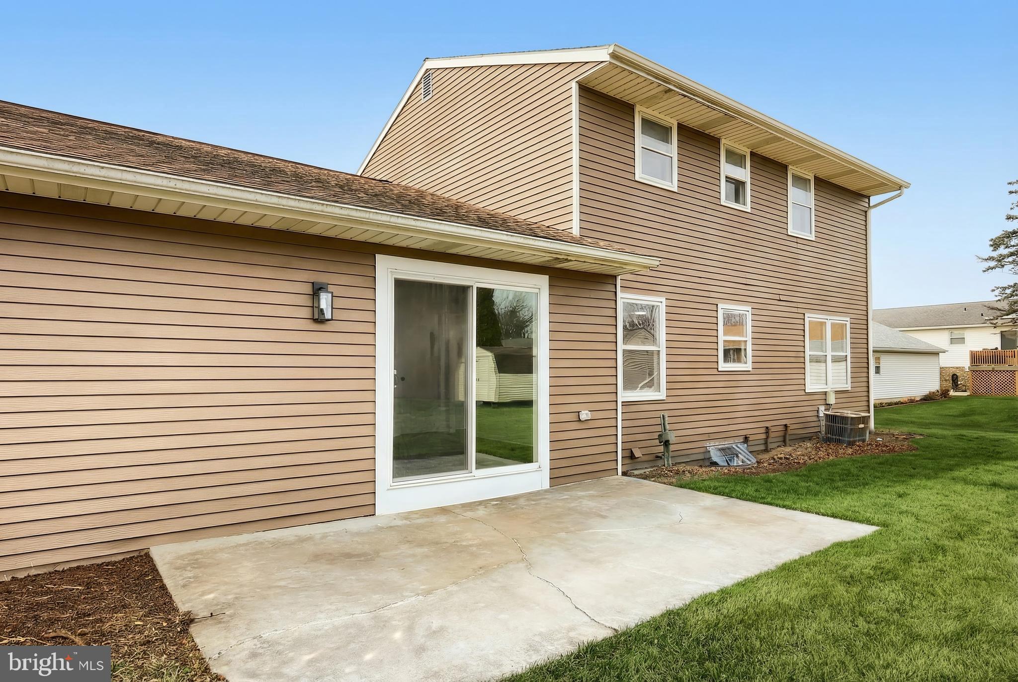 2510 Redwood Road Dover, PA 17315 - Photo 14 of 56 a front view of a house with a yard