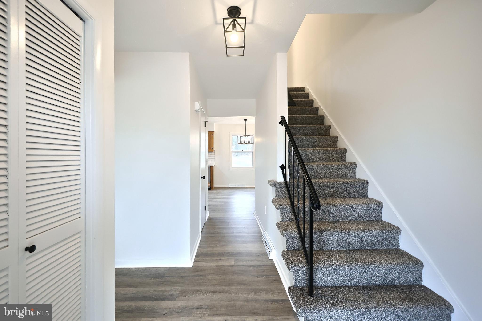 2510 Redwood Road Dover, PA 17315 - Photo 18 of 56 a view of a hallway with wooden floor and entryway