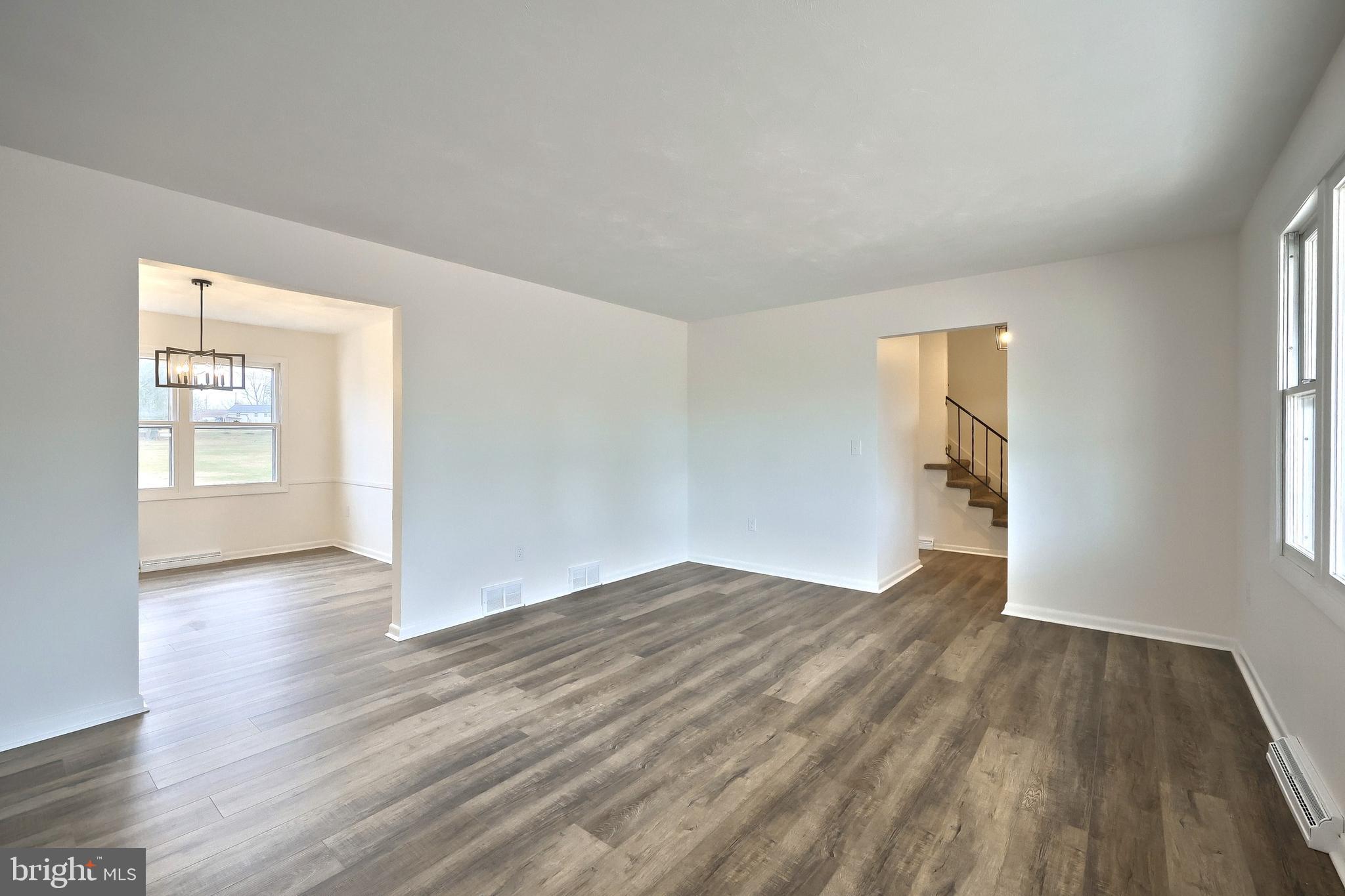 2510 Redwood Road Dover, PA 17315 - Photo 22 of 56 an empty room with wooden floor and windows
