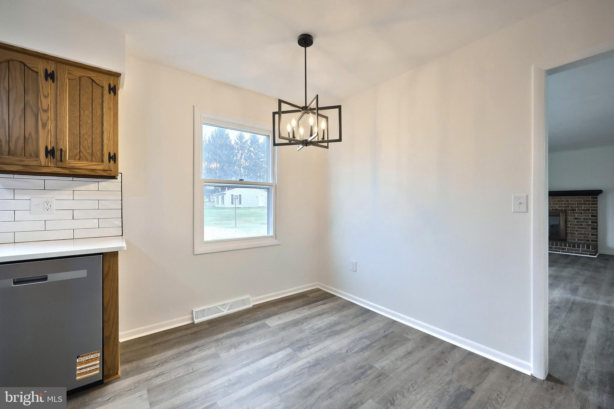 2510 Redwood Road Dover, PA 17315 - Photo 30 of 56 a view of a room with wooden floor cabinets and a window